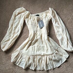 ANGEL BIBA MINI DRESS in beige 
Size small